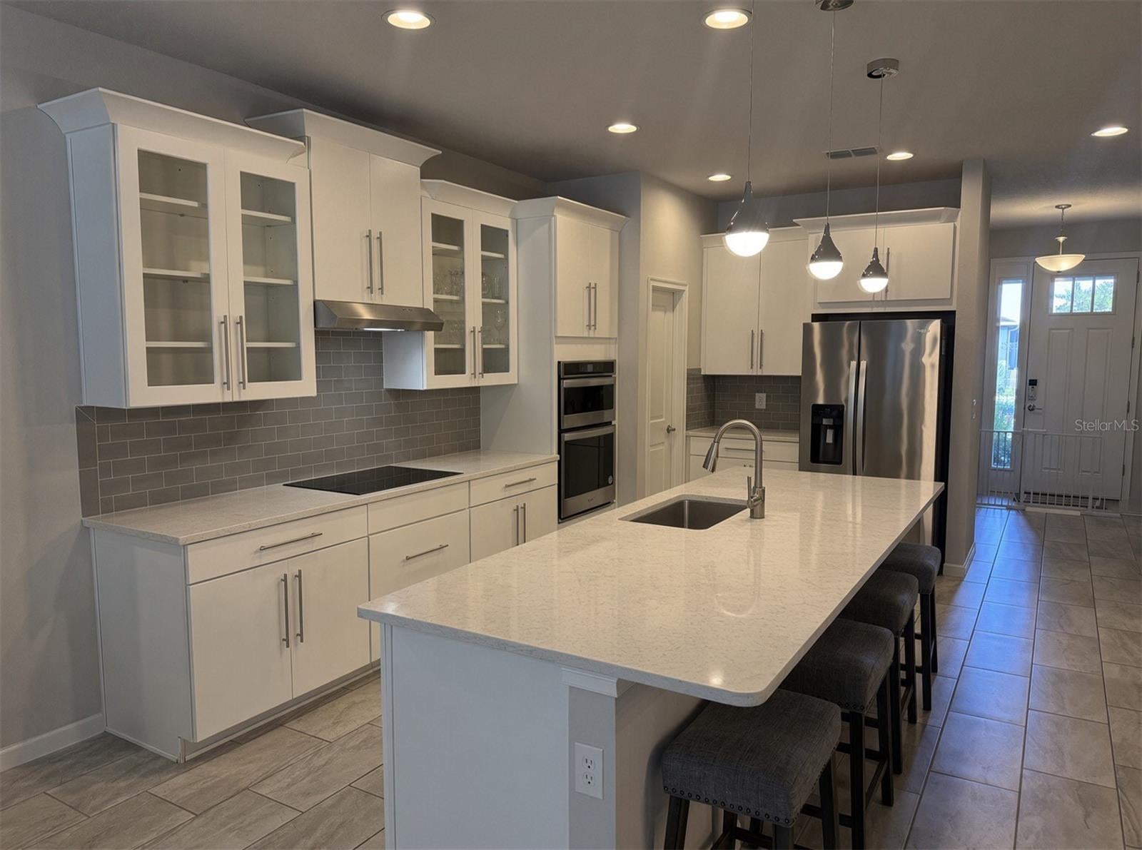 Cocina y comedor de la casa en Satin Lily Drive