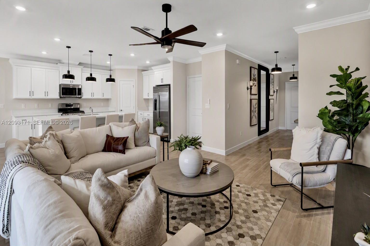 Sala y cocina con isla del townhouse